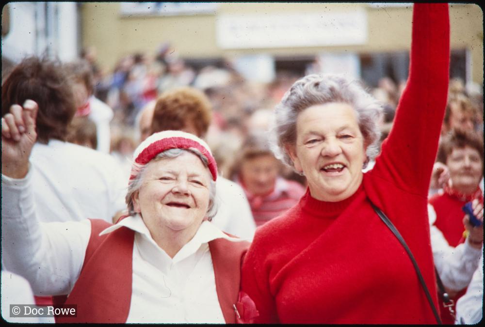 Portrait of two women from Old Oss party cheering