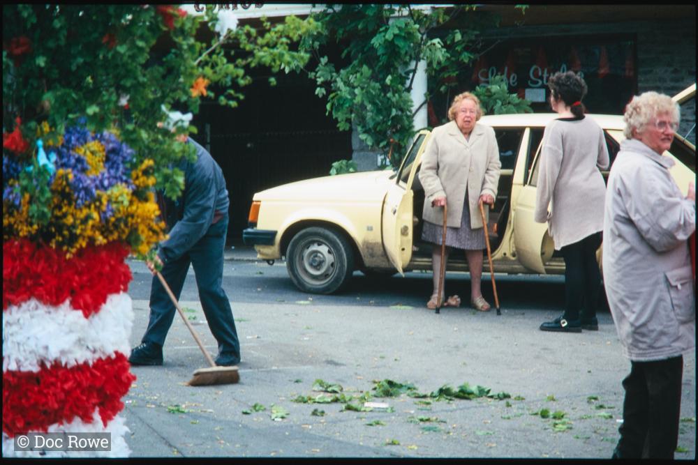 Sweeping the street after put up decorations