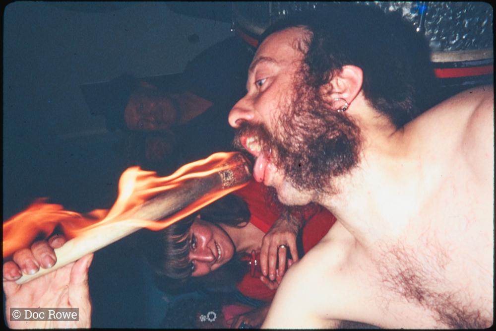 Fire breathing portrait with woman framed in shot